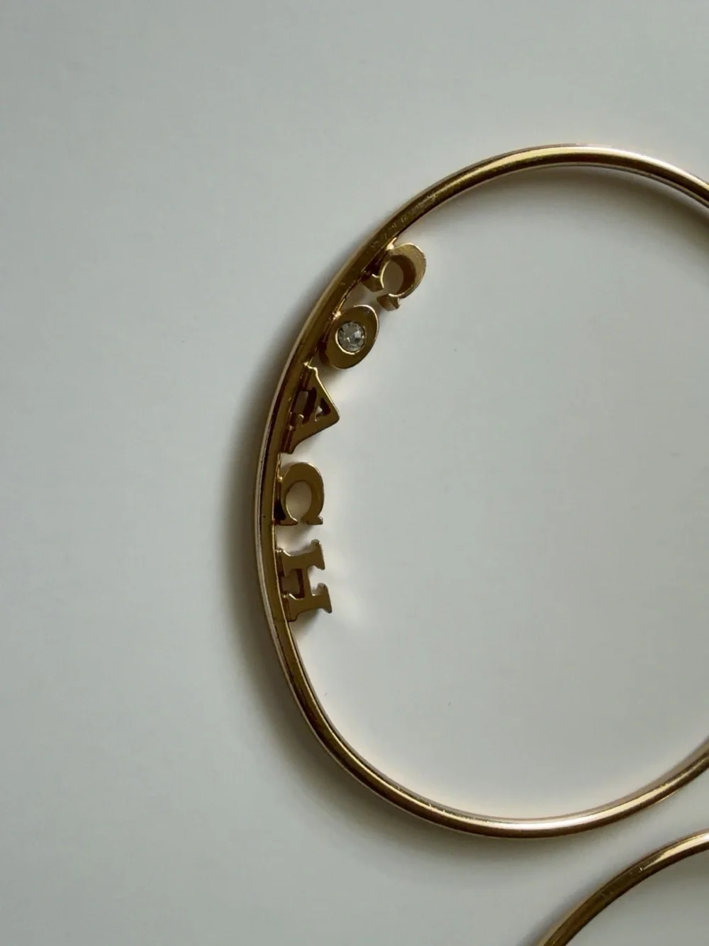 Coach Gold Letter Logo Hoop Earrings